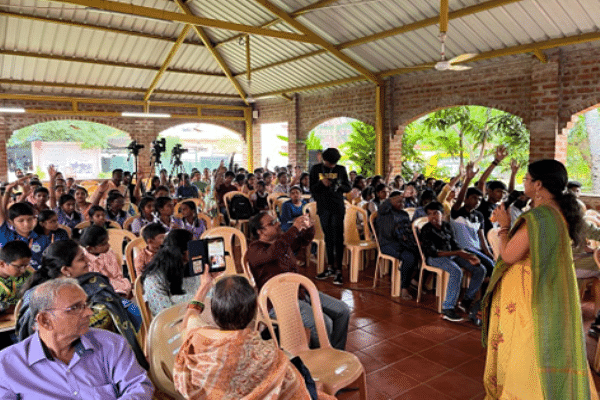 Author Sai Swaroopa engaging with children.