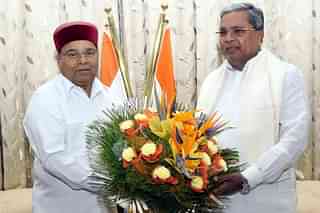Karnataka Governor Gehlot with CM Siddaramaiah (Pic Via Twitter)