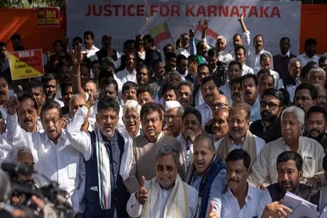 Karnataka chief minister Siddaramaiah and his deputy DK Shivakumar at a protest in Delhi. (AP)