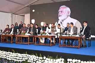 Road Transport and Highways Minister Nitin Gadkari and other officials on the stage after the inspection.