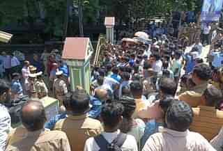 Protestors in front of St Gerosa School in Karnataka's Mangaluru. 