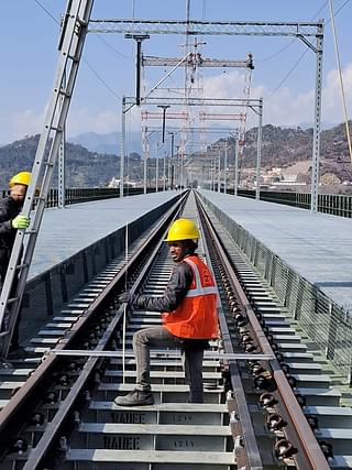Testing and installation over the tracks.