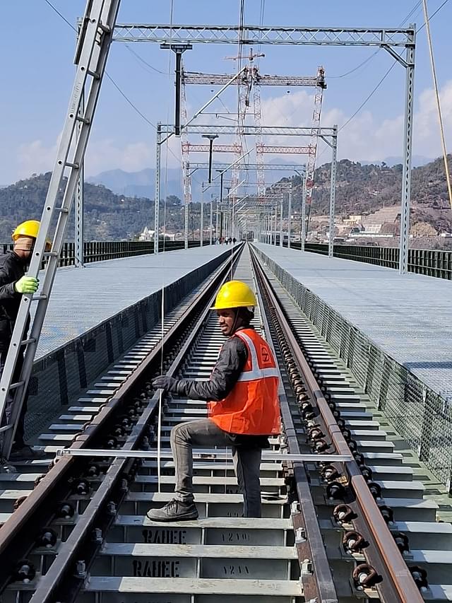 Testing and installation over the tracks.
