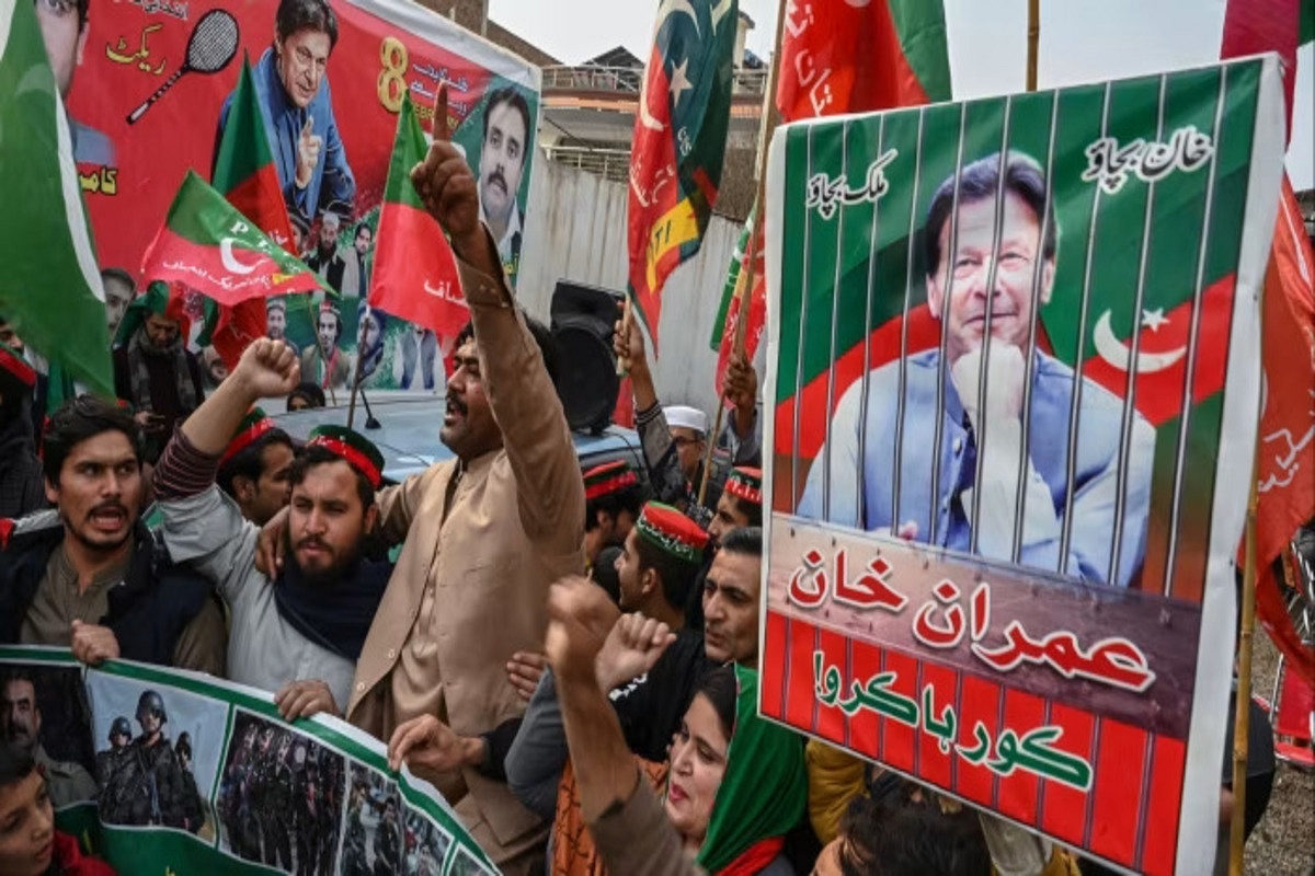 Poster of Jailed Ex-PM Imran Khan at an election rally. Abdul Majeed/AFP/Getty Images