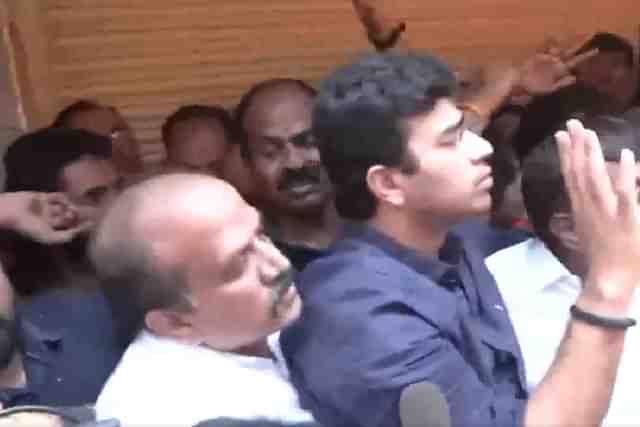 Tejasvi Surya protesting against attack on shopkeeper