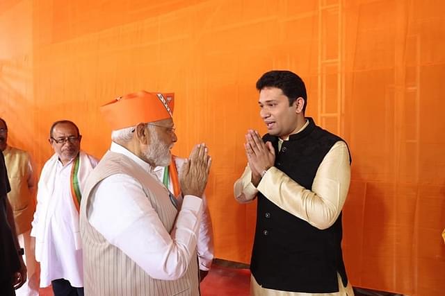 Prime Minister Narendra Modi with BJP's Serampore candidate Kabir Shankar Bose. (Facebook)
