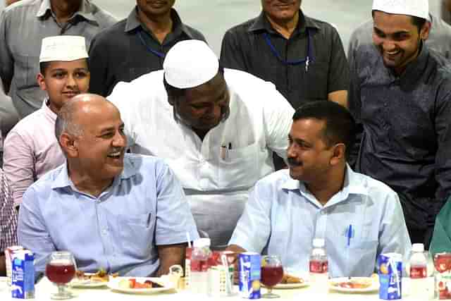 Arvind Kejriwal and Manish Sisodia at an Iftaar party (K Asif/India Today Group/Getty Images)