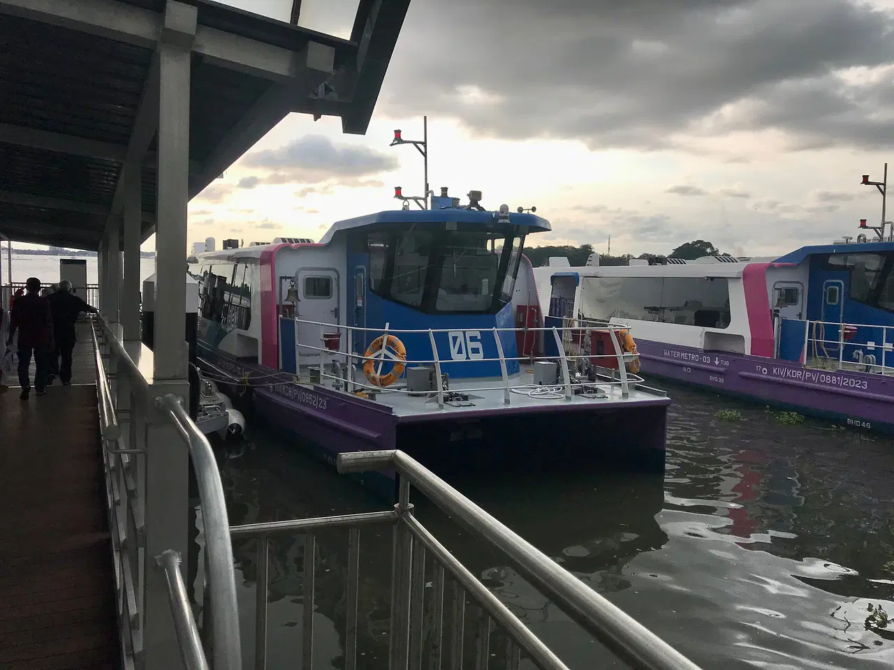 The docked catamarans.