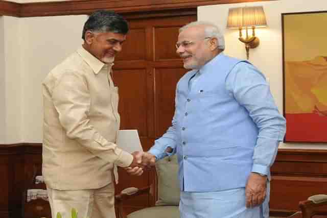 TDP chief Chandrababu Naidu with PM Modi.