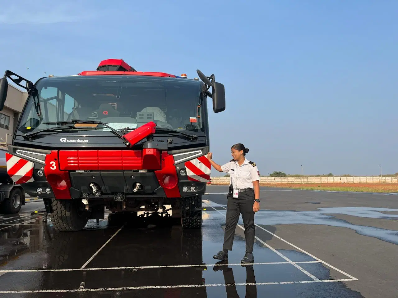 Disha Naik during her shift at the airport.