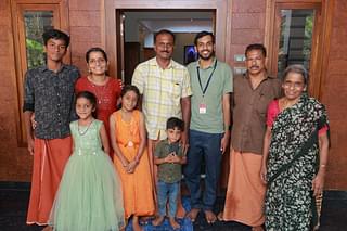 Rajesh with Babu and his family.