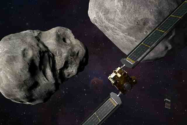 Illustration of NASA’s DART spacecraft and the Italian Space Agency’s (ASI) LICIACube prior to impact at the Didymos binary system. (NASA/Johns Hopkins APL)
