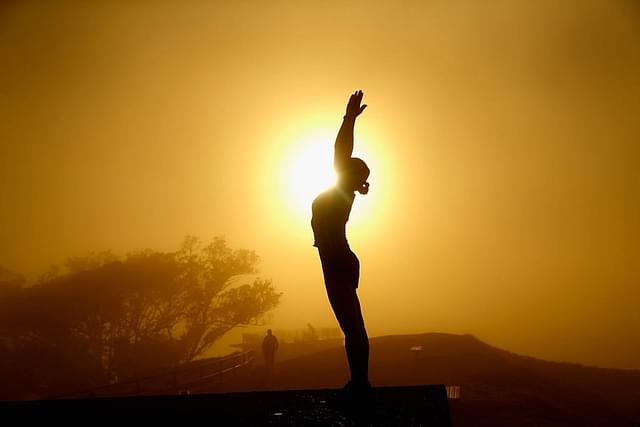 A lady practises yoga. (Phil Walter/Getty Images) 