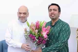 RLD Chief Jayant Chaudhary (R) with Union Home Minister Amit Shah (L)