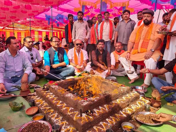 Overseeing the rituals.