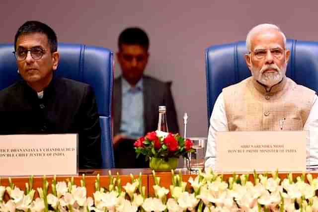 Former CJI Chandrachud and PM Modi 