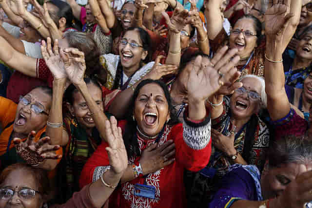 Women practicing laughter yoga.