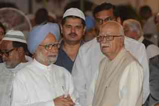 Former Prime Minister Manmohan Singh with the BJP's 2009 prime ministerial candidate, L K Advani. File photo (PIB)