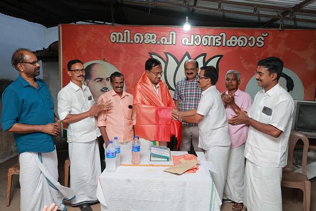 Dr Salam being welcomed at the Pandikkad office. (Special Arrangement)