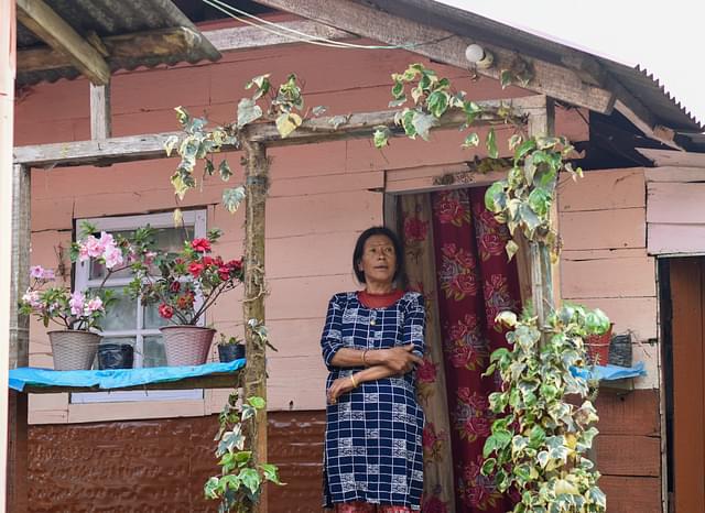 Sushma Rai in front of her house. Photo credit: SAYAN SARKAR