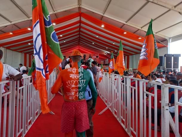 A BJP supporter at Amit Shah's rally at Kotdwar Women at BJP's Kotdwar rally (Image credit: Sumati Mehrishi)