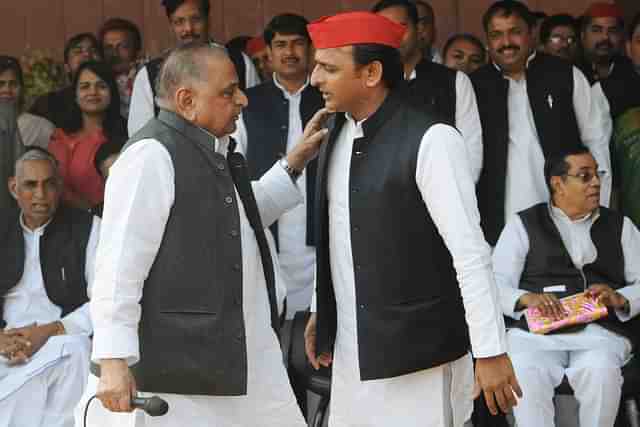 Akhilesh Yadav with his father Mulayam Singh Yadav. (Subhankar Chakraborty/Hindustan Times via Getty Images)