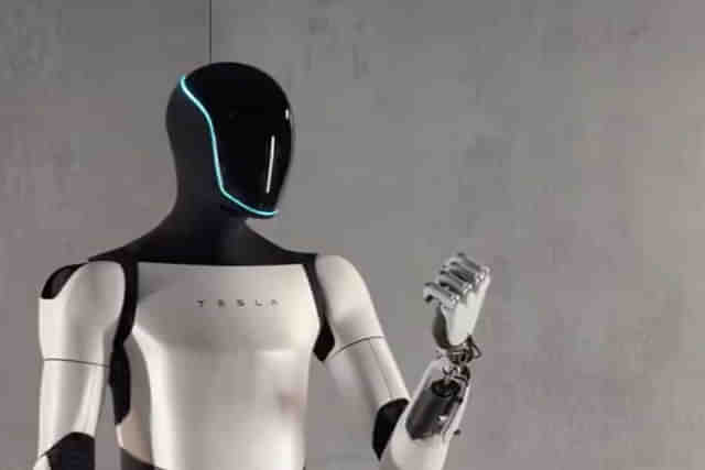 A marketing image of the Tesla Optimus robot.