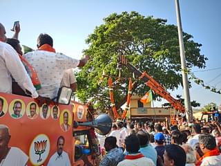 JCB, cranes are used to garland the candidate and shower flower petals as he arrives.