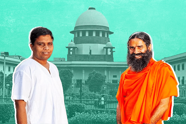 Yoga Guru Baba Ramdev and his disciple Balkrishna.