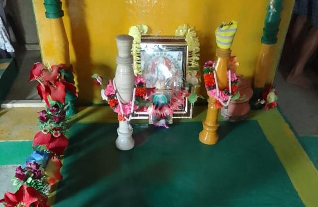 Portrait of Shree Ram, Sita and Bharat at a Ram Mandir.
