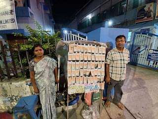 Petchiyammal (L) and Murthy (R) at their lottery ticket stall. (Image Credit: S Rajesh)