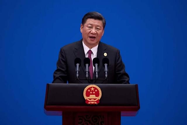 President Xi Jinping speaking at a conference in Beijing. (Photo by Nicolas Asfouri-Pool/Getty Images)