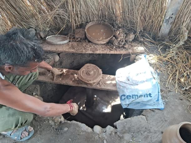 Vijay showing the mechanism of this manual tool. (AnkitSaxena/Swarajya)