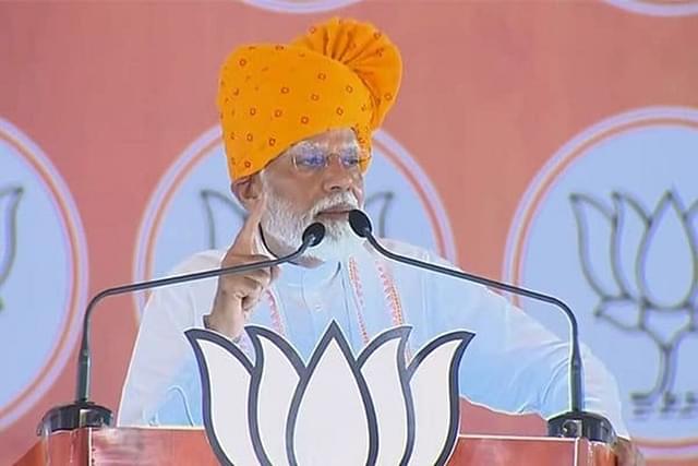 Prime Minister Narendra Modi speaking at the Rajasthan rally.