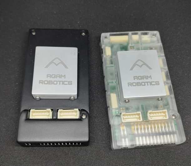 The Agam Autopilot V6X-RT (right) with the Agam carrier board