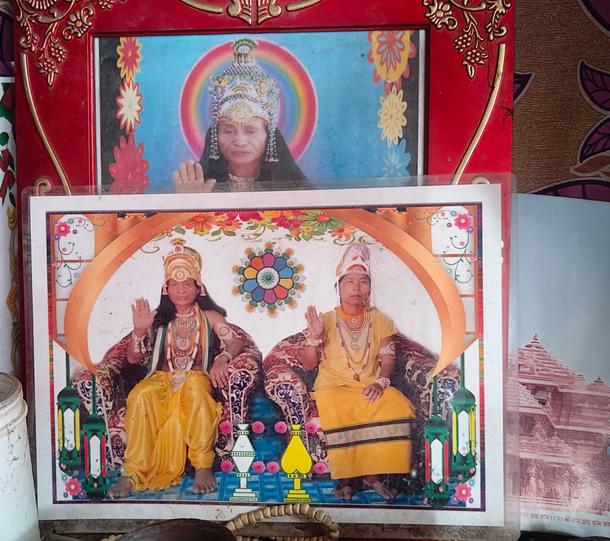 A portrait of Maniram Bru and his dharam-patni at a shrine at Jatindra Reang's house.
