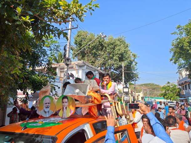 Hopping onboard the campaign vehicle.