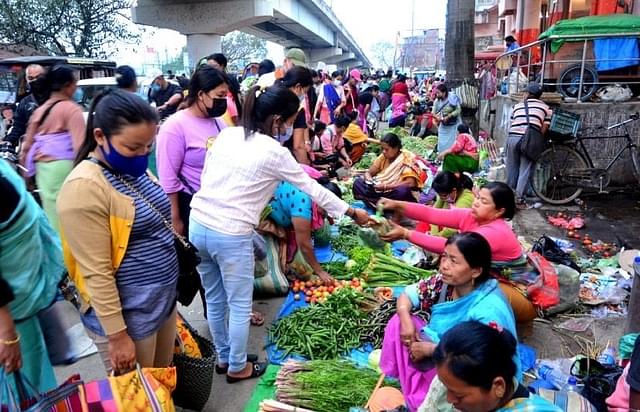Brisk business at stalls around the famous Ima Keithel market in Imphal.