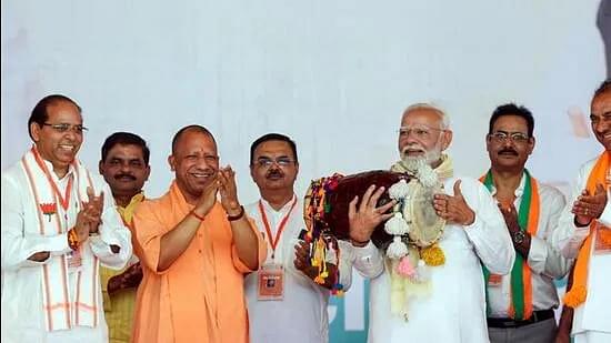 PM Narendra Modi with CM Yogi Adityanath in Amroha.