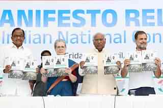 Congress leaders with the party's manifesto.