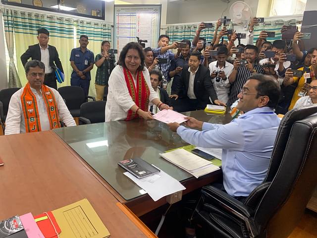 Maharani Kriti Singh Debbarma filing her nomination papers. On her right is Chief Minister Manik Saha