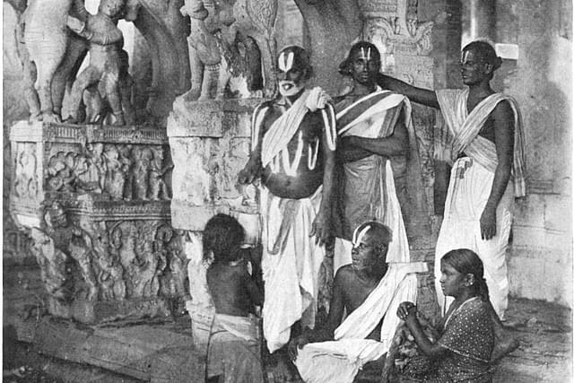 Brahmins and a devadasi. (Wikimedia Commons)