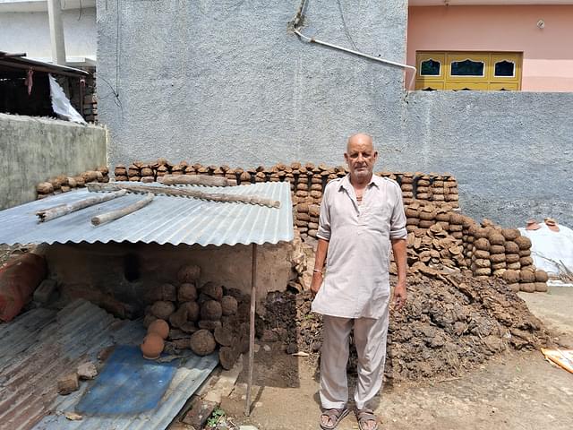 Karnal Prajapati near his oven. (AnkitSaxena/Swarajya)