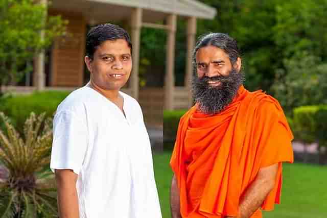 Patanjali Ayurved's co-founder Ramdev and managing director Balakrishna.