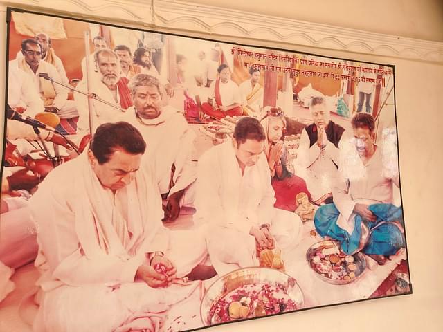 Kamal Nath and Nakul Nath partaking in a puja at the temple in 2015. 