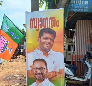 A BJP poster on the roadshow route.(Image Credit: S Rajesh)