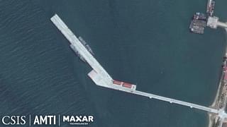 Two Chinese naval vessels berthed on the newly constructed pier. (AMTI /Maxar)
