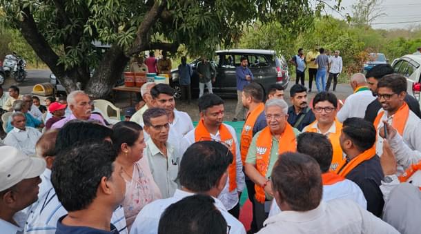 Dhaval Patel and Arvindbhai Patel are joined by Gujarat’s Finance Minister Kanubhai Desai.