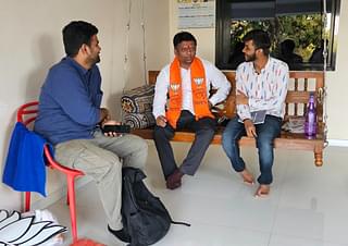 Anmol Jain and Ankit Saxena with Dhaval Patel.