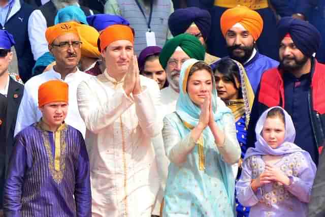 Canadian Prime Minister Justin Trudeau and his wife Sophie Gregoire Trudeau with their children pay obeisance, on 21  February 2018 at Golden Temple in Amritsar. (Sameer Sehgal/Hindustan Times via GettyImages)